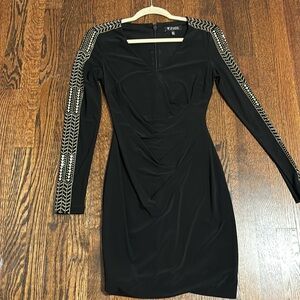 Black fitted Guess dress with stud detail on the arms